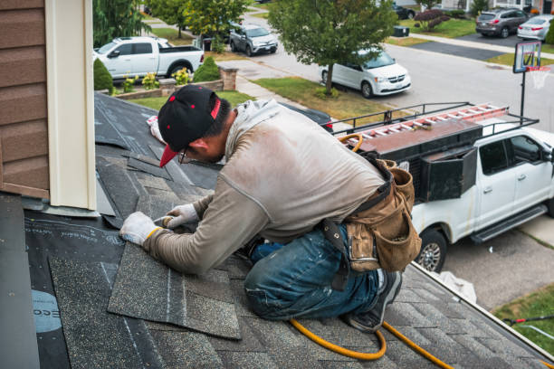 Professional Emergency Roof Repair technician working in Long Beach, NY